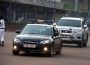 A Police lead car escorting a Ugandan Government Official's motorcade/convoy
