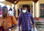 Soroti DISO ( With Mask) being led to Prison / Photo: URN
